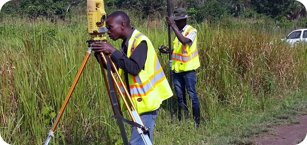 Surveyors using Total Station in a dense urban setting